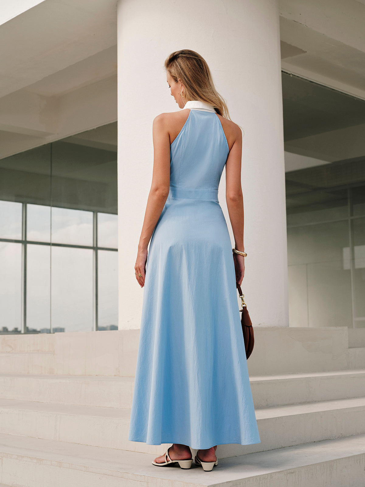 Maxi jurk mouwloos met kraag knoopsluiting zomer elegant casual modern